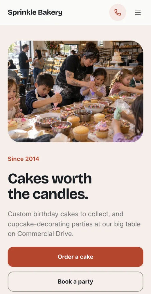 Sprinkle Bakery’s website on a phone: a warm bakery site with an Order a cake button